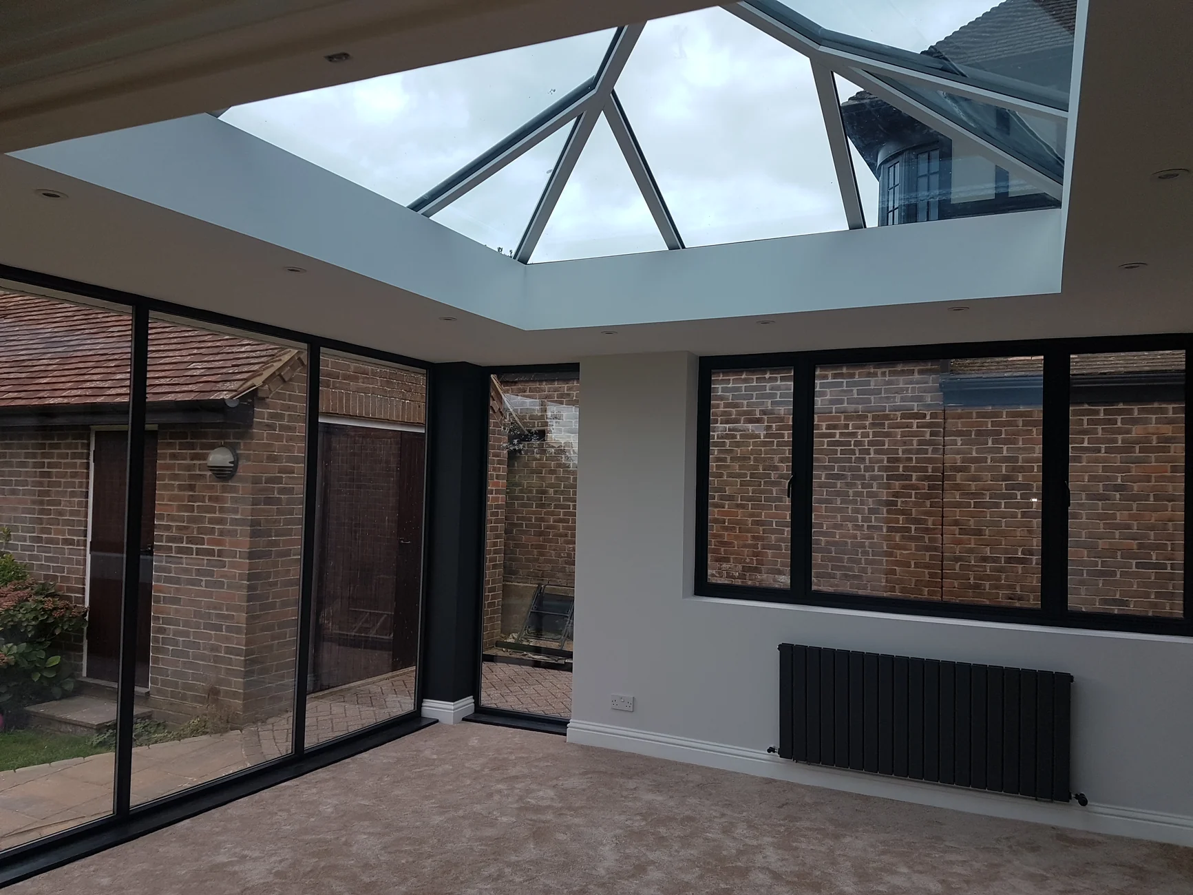 Bright, completed extension with generous glazing and natural daylight